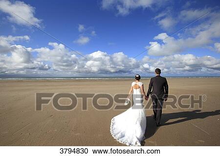France, couple of married on the beach. View Large Photo Image Stock Image - France, couple of married on the beach.. Fotosearch