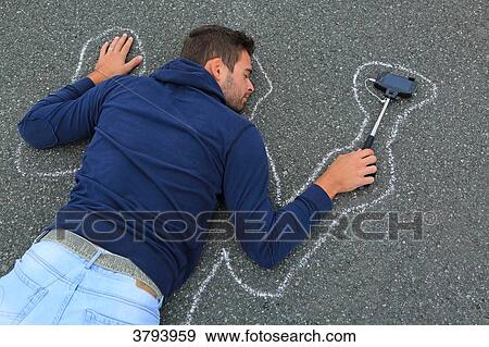 France, dead man with smartphone View Large Photo Image Stock Photo - France, dead man with smartphone. Fotosearch