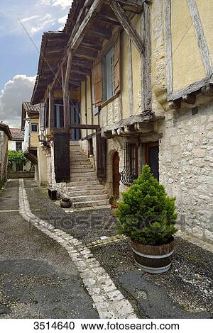 France, Dordogne, vertical view of a medieval street Issigeac View Large Photo Image Stock Image - France, Dordogne, vertical view of a medieval street Issigeac. Fotosearch