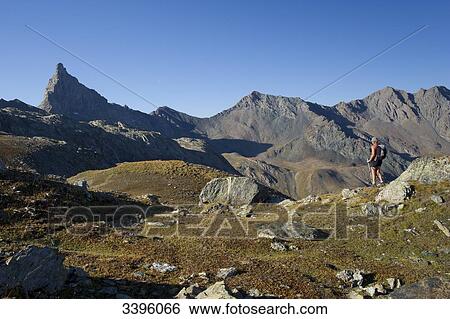 Stock Photograph - France, Eastern France, Alps, Queyras Massif, Saint Veran, highest village of Europe (2050m), hiking to the mountain refuge la Blanche and the Tete des Toilies summit. Fotosearch