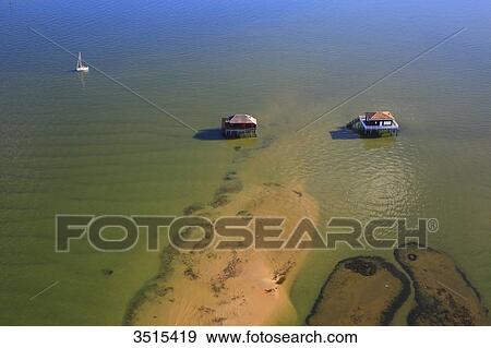 France, Gironde. Arcachon Bay. Bird Island. Cabin built on stilts. View Large Photo Image Stock Photo - France, Gironde. Arcachon Bay. Bird Island. Cabin built on stilts.. Fotosearch