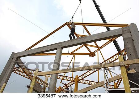 France, House building, handling safety with a crane, construction of a steel frame View Large Photo Image Stock Photo - France, House building, handling safety with a crane, construction of a steel frame. Fotosearch