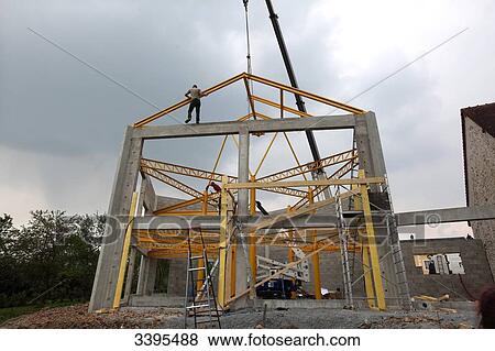 France, House building, handling safety with a crane, construction of a steel frame View Large Photo Image Stock Photo - France, House building, handling safety with a crane, construction of a steel frame. Fotosearch