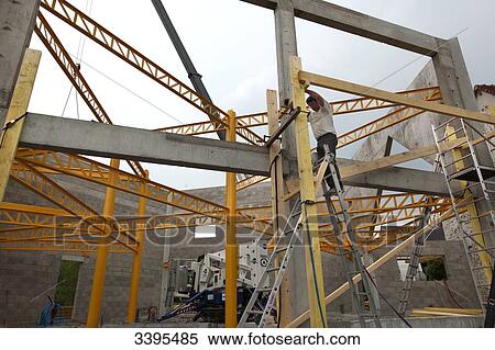 France, House building, handling safety with a crane, construction of a steel frame View Large Photo Image Stock Photography - France, House building, handling safety with a crane, construction of a steel frame. Fotosearch