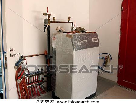 France, House building, installing a heat pump and a floor heating system View Large Photo Image Stock Image - France, House building, installing a heat pump and a floor heating system. Fotosearch