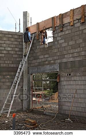 France, House building. Raising of the house's walls. Safety on a scaffold/scale. Installation of a concrete formwork View Large Photo Image Stock Image - France, House building. Raising of the house's walls. Safety on a scaffold/scale. Installation of a concrete formwork. Fotosearch