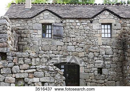 Stock Photo - France, Lozere, Lodge of Felgerolles, old stone walls, granite. Fotosearch
