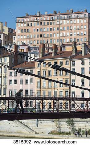 France. Lyon. The footbridge Saint Vincent on the Saone and the facades of the quay Saint Vincent View Large Photo Image Stock Image - France. Lyon. The footbridge Saint Vincent on the Saone and the facades of the quay Saint Vincent. Fotosearch