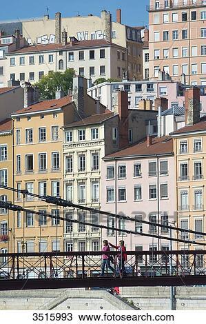 France. Lyon. The footbridge Saint Vincent on the Saone and the facades of the quay Saint Vincent View Large Photo Image Stock Image - France. Lyon. The footbridge Saint Vincent on the Saone and the facades of the quay Saint Vincent. Fotosearch