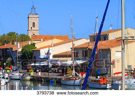 France, Marseillan. The Harbor. Church. View Large Photo Image Stock Photo - France, Marseillan. The Harbor. Church.. Fotosearch
