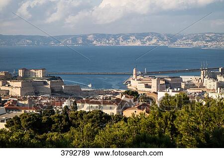 France, Marseille, view of the city from Notre Dame de la Garde View Large Photo Image Stock Photo - France, Marseille, view of the city from Notre Dame de la Garde. Fotosearch