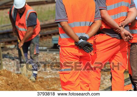 France, men at work with security suits. View Large Photo Image Stock Photo - France, men at work with security suits.. Fotosearch