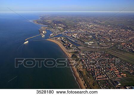 France, Norhern France, Pas-de-Calais, Calais. The harbour. The village of Bleriot-Plage in the foreground. View Large Photo Image Stock Image - France, Norhern France, Pas-de-Calais, Calais. The harbour. The village of Bleriot-Plage in the foreground.. Fotosearch
