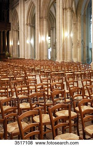 France, Normandy. Manche. Coutances. Deserted cathedral of Coutances. Alignment of empty chairs. View Large Photo Image Stock Photo - France, Normandy. Manche. Coutances. Deserted cathedral of Coutances. Alignment of empty chairs.. Fotosearch