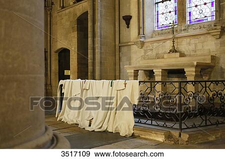 Stock Photo - France, Normandy, Manche. Coutances. Cathedral of Coutances. Cassocks put aside while waiting for the mass.. Fotosearch