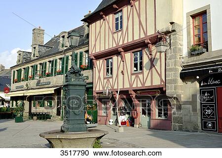 France, North-Western France, Brittany, Concarneau, inside of the walled town. Traditional houses. Traditional square with its fountain. Historical center of the city View Large Photo Image Stock Image - France, North-Western France, Brittany, Concarneau, inside of the walled town. Traditional houses. Traditional square with its fountain. Historical center of the city. Fotosearch