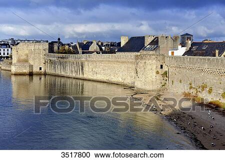 Stock Image - France, North-Western France, Brittany, Concarneau, former battlements protecting the walled town. Fotosearch