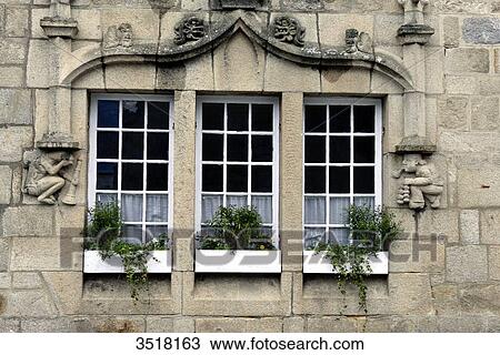 France, North-Western France, Brittany, Roscof harbour, old traditional granit house in the city center, facade with window View Large Photo Image Stock Image - France, North-Western France, Brittany, Roscof harbour, old traditional granit house in the city center, facade with window. Fotosearch