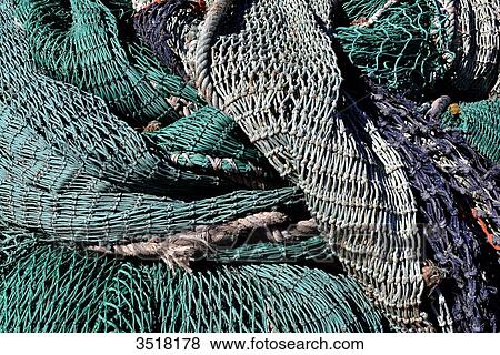 France, North-Western France, Brittany, Le Guilvinec, fishing port. Fishing nets for the trawlers View Large Photo Image Stock Photo - France, North-Western France, Brittany, Le Guilvinec, fishing port. Fishing nets for the trawlers. Fotosearch
