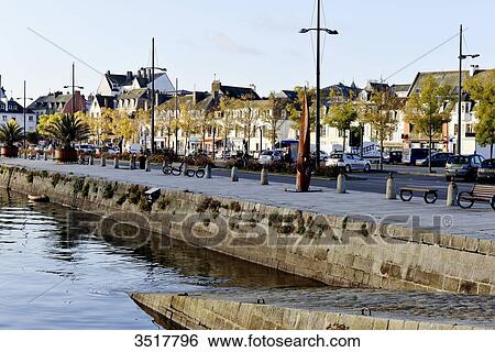 Stock Photograph - France, North-Western France, Brittany, Concarneau, port quay in the open part of the modern city. Fotosearch