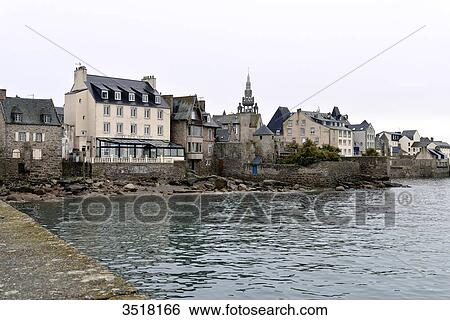 France, North-Western France, Brittany, Roscof harbour, seaside at high tide with houses on the border View Large Photo Image Stock Photograph - France, North-Western France, Brittany, Roscof harbour, seaside at high tide with houses on the border. Fotosearch