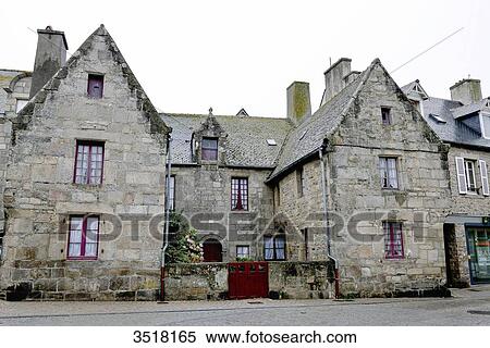 Stock Photography - France, North-Western France, Brittany, Roscof harbour, old traditional granit house in the city center. Fotosearch