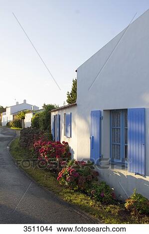 France, North-Western France, Ile d'Yeu, houses along a road to Saint-Sauveur View Large Photo Image Picture - France, North-Western France, Ile d'Yeu, houses along a road to Saint-Sauveur. Fotosearch