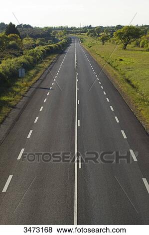 Stock Photo - France, North-Western France, Les Moutiers-en-Retz, the blue road (D13). Fotosearch