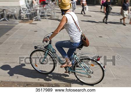 France, North-Western France, Nantes, woman on a bike View Large Photo Image Stock Photo - France, North-Western France, Nantes, woman on a bike. Fotosearch