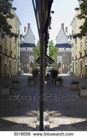 Stock Photograph - France, North-Western France, Nantes, Rue du Chateau, reflections in a shop window. Fotosearch
