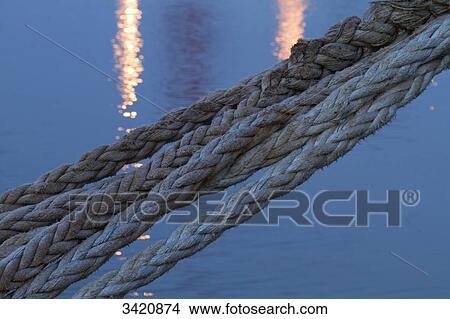 France, North-Western France, Saint-Nazaire, Bassin de Penhout, Quai des Darses, close up on mooring lines View Large Photo Image Picture - France, North-Western France, Saint-Nazaire, Bassin de Penhout, Quai des Darses, close up on mooring lines. Fotosearch