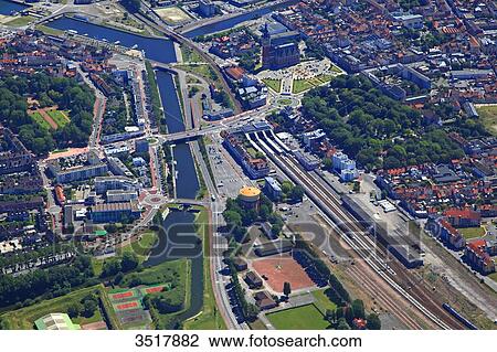 France, Northern France, Pas de Calais. Calais. City hall and train station View Large Photo Image Stock Image - France, Northern France, Pas de Calais. Calais. City hall and train station. Fotosearch