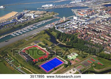Stock Photography - France, Northern France, Pas de Calais. Calais. Stadium and field hockey field.. Fotosearch