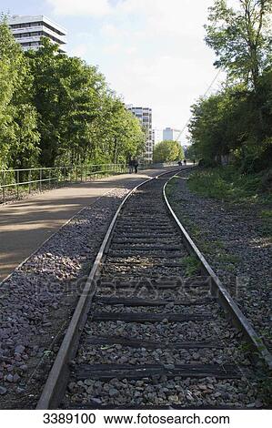 France, Paris, 15th district, small section of the Chemin de fer de Petite Ceinture (little belt railway) between the rue Saint Charles and the rue Olivier de Serres View Large Photo Image Stock Image - France, Paris, 15th district, small section of the Chemin de fer de Petite Ceinture (little belt railway) between the rue Saint Charles and the rue Olivier de Serres. Fotosearch