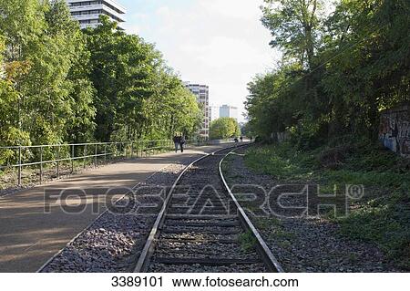 France, Paris, 15th district, small section of the Chemin de fer de Petite Ceinture (little belt railway) between the rue Saint Charles and the rue Olivier de Serres View Large Photo Image Stock Image - France, Paris, 15th district, small section of the Chemin de fer de Petite Ceinture (little belt railway) between the rue Saint Charles and the rue Olivier de Serres. Fotosearch