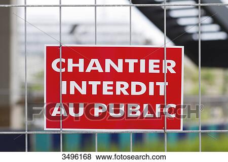 Stock Photo - France, Paris, 17th district, Clichy-Les Batignolles, forbidden sign on a building site. Fotosearch