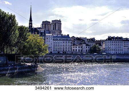 France, Paris, 4th district, banks of the Seine River, view from the bridge Louis-Philippe, Notre-Dame Cathedral View Large Photo Image Stock Image - France, Paris, 4th district, banks of the Seine River, view from the bridge Louis-Philippe, Notre-Dame Cathedral. Fotosearch