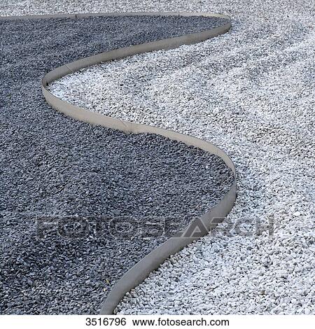 France. Paris. 4th district. The Marais. Zen garden, gravel garden of the Maison Europeenne de Photographie (European House of Photography) View Large Photo Image Stock Photograph - France. Paris. 4th district. The Marais. Zen garden, gravel garden of the Maison Europeenne de Photographie (European House of Photography). Fotosearch