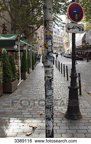 Stock Photograph - France, Paris, 6th district, rue Danton, bonding of a sign post. Fotosearch