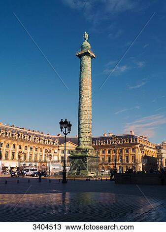 Stock Image - France. Paris 75001, Place Vendome and the column in the center with Napoleon, architect Jules Hardouin-Mansart.. Fotosearch