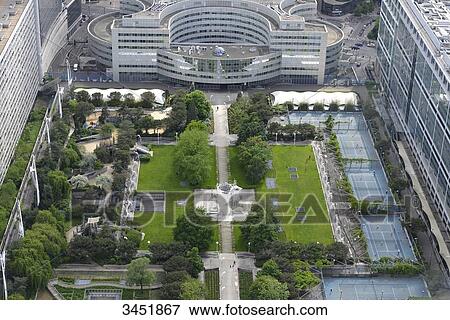France, Paris, aerial view of a hanging garden at the foot of the Montparnasse Tower. Many tennis courts View Large Photo Image Stock Photo - France, Paris, aerial view of a hanging garden at the foot of the Montparnasse Tower. Many tennis courts. Fotosearch