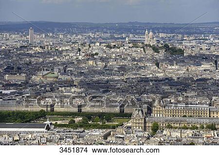 Picture - France, Paris, aerial view of the Louvre Museum and the Tuileries Garden, Basilicaof the Sacred heart of Paris in the background. Paris Opera on the left-hand. Fotosearch