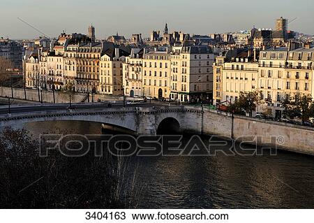 Stock Image - France, Paris, banks of the Seine and Ile Saint Louis, view from the terrace of the Arab World Institute. Fotosearch