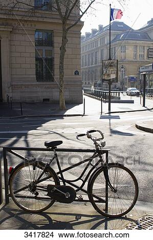 France, Paris, Boulevard Saint-Germain, Place H. Mondor, bike chained to a barrier View Large Photo Image Picture - France, Paris, Boulevard Saint-Germain, Place H. Mondor, bike chained to a barrier. Fotosearch