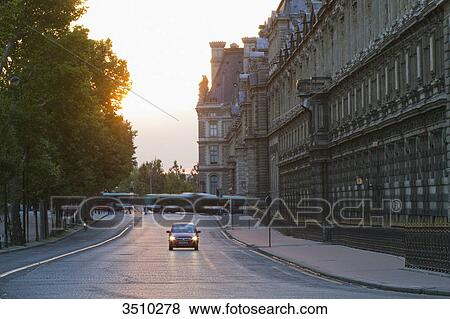 France, Paris, Quai Francois Mitterrand along the south wing of the Louvre Museum, evening View Large Photo Image Stock Photo - France, Paris, Quai Francois Mitterrand along the south wing of the Louvre Museum, evening. Fotosearch
