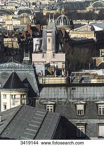 Picture - France, Paris, rooftop of the French Police Prefecture, Grand Palais, coupola of the Institut from the tower of the Notre-Dame Cathedral. Fotosearch