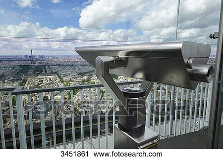 France, Paris, terrace of the Montparnasse Tower. Telescope in the foreground. Aerial view of Paris and Eiffel Tower in the background. Blue sky with clouds View Large Photo Image Stock Image - France, Paris, terrace of the Montparnasse Tower. Telescope in the foreground. Aerial view of Paris and Eiffel Tower in the background. Blue sky with clouds. Fotosearch