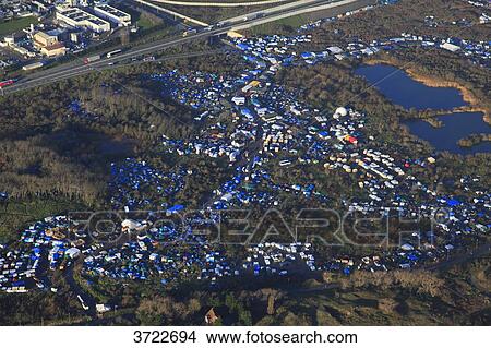 France, Pas de Calais, Calais. Aerial view of the jungle. Migrants camp.. View Large Photo Image Picture - France, Pas de Calais, Calais. Aerial view of the jungle. Migrants camp... Fotosearch
