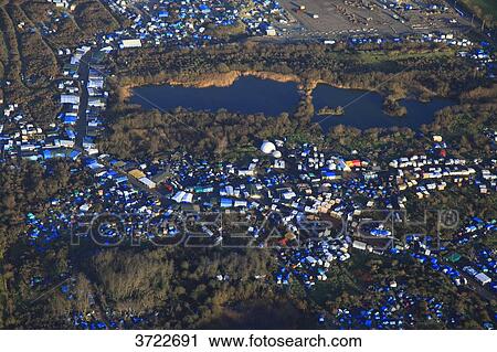 France, Pas de Calais, Calais. Aerial view of the jungle. Migrants camp.. View Large Photo Image Stock Image - France, Pas de Calais, Calais. Aerial view of the jungle. Migrants camp... Fotosearch