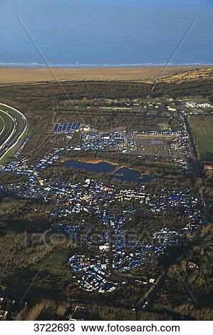 France, Pas de Calais, Calais. Aerial view of the jungle. Migrants camp.. View Large Photo Image Stock Image - France, Pas de Calais, Calais. Aerial view of the jungle. Migrants camp... Fotosearch